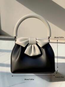 春夏新品优雅小众设计黑白撞色蝴蝶结手提包优雅时尚百搭高端优雅通勤单品简约日常逛街派对黑白