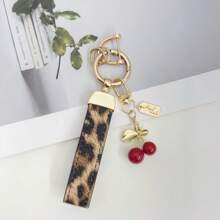 TTOBS 1pc Exquisitely Crafted Leopard Print Leather Car Key Chain With Adorable Cherry Pendant - , Fashionable And Multi-Functional Backpack Keychain - The Perfect Accessory For Backpacks. The Perfect Valentine's Day Gift, Also An Ideal Gift For Your Beloved Girlfriend.