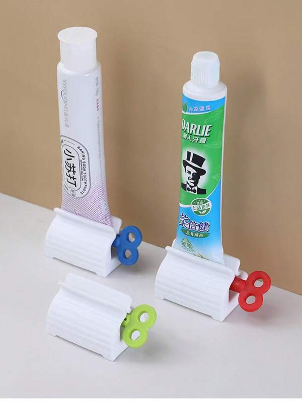 Exprimidor manual de pasta de dientes | Accesorio de baño de alta calidad | Dispensador de plástico blanco con diseño de hojas | Sin batería | Multiuso para pasta de dientes y cosméticos | Organizador ahorra espacio para el hogar y de vuelta al colegio