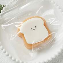 1 件超柔软的 Squishy Toast 玩具 - 可爱的笑脸设计，慢回弹，易于清洁，青少年减压玩具，由合成橡胶制成，有趣的桌面装饰，办公室压力释放可爱玩具 - 彩色 - 查看 10