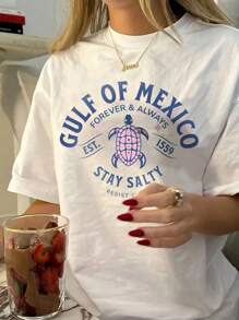 海湾海龟图案T恤，宽松休闲适合夏季海滩度假，女士纯色圆领短袖简约上衣