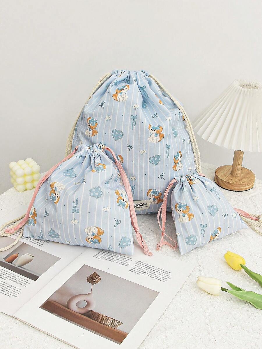 1Pc schattige hond strik bedrukte reis trekkoord rugzak huidverzorging trekkoord opbergtas make-up tas ondergoed opbergtas maandverband tas essentiële reis opbergset, verpakkingsdoos set, bagage opbergtas, mat bedrade headset, oordopje, headset, oplader, lippenstift, cosmetica, parfum, huidverzorging en schoonheidsproducten, huisdecoratie, geschikt voor moeders, studenten, vrouwen, sleutels, vakantiecadeaus