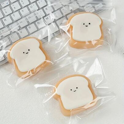 1 件超柔软的 Squishy Toast 玩具 - 可爱的笑脸设计，慢回弹，易于清洁，青少年减压玩具，由合成橡胶制成，有趣的桌面装饰，办公室压力释放可爱玩具