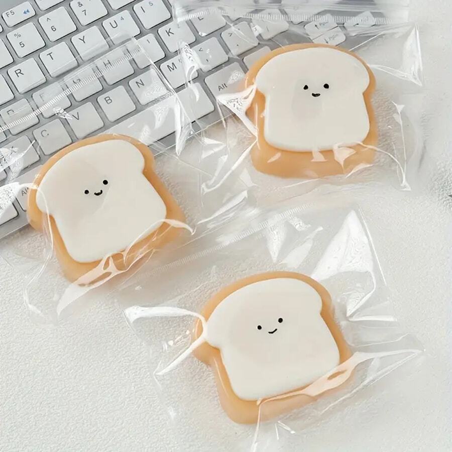 1 件超柔软的 Squishy Toast 玩具 - 可爱的笑脸设计，慢回弹，易于清洁，青少年减压玩具，由合成橡胶制成，有趣的桌面装饰，办公室压力释放可爱玩具