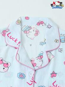 Set de 2 piezas de pijama para mujer de primavera/verano con parte superior de manga corta con botones y bolsillo con estampado de Hello Kitty de Sanrio y pantalones cortos con lazo, adecuado para uso en casa