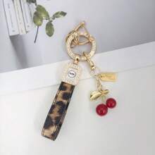 TTOBS 1pc Exquisitely Crafted Leopard Print Leather Car Key Chain With Adorable Cherry Pendant - , Fashionable And Multi-Functional Backpack Keychain - The Perfect Accessory For Backpacks. The Perfect Valentine's Day Gift, Also An Ideal Gift For Your Beloved Girlfriend.