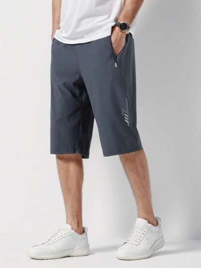 速干男士运动健身拉链口袋抽绳沙滩短裤，宽松健身裤，透气面料