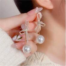 1 paire de boucles d'oreilles élégantes avec nœud papillon, strass et perles. Accessoires de bijoux polyvalents et pour femmes