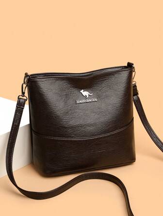 1 pieza Bolso bandolera de gran capacidad, liviano y de unicolor de piel de PU con decoración de metal tipo canguro, versátil para uso diario de mujeres