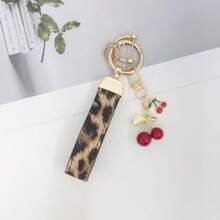 TTOBS 1pc Exquisitely Crafted Leopard Print Leather Car Key Chain With Adorable Cherry Pendant - , Fashionable And Multi-Functional Backpack Keychain - The Perfect Accessory For Backpacks. The Perfect Valentine's Day Gift, Also An Ideal Gift For Your Beloved Girlfriend.
