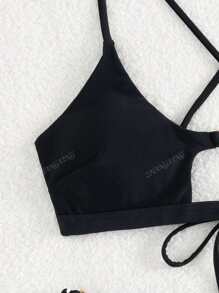 Nuovo set di costumi da bagno in stile e sexy per donna, con top a fascia in un unico colido e decorazione metallica, con laccetti di corda per allacciatura
