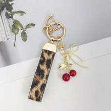 TTOBS 1pc Exquisitely Crafted Leopard Print Leather Car Key Chain With Adorable Cherry Pendant - , Fashionable And Multi-Functional Backpack Keychain - The Perfect Accessory For Backpacks. The Perfect Valentine's Day Gift, Also An Ideal Gift For Your Beloved Girlfriend.