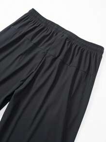 Lichtgewicht, ademende en elastische hardloopbroek voor heren met ritszakken en een tailleband met trekkoord. Zachte, vochtafvoerende ijszijde, modieuze effen sportbroek voor joggen, trainen, casual, vissen en dagelijks gebruik.