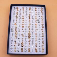 Set de 100 piezas de pendientes de studs pequeños de plástico con rhinestones de diseño aleatorio, surtidos, empaquetados en caja