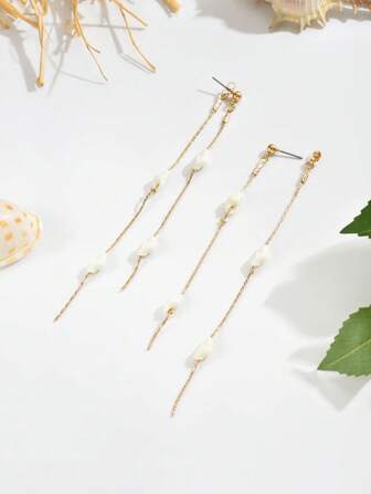 2 st eleganta bohemiska barocka örhängen med konstpärla och oregelbunden tofs och hjärtformade örhängen. Blandade designer inklusive små snäckor. Lämpliga för fest, vardagskläder, alla hjärtans dag, jul, Thanksgiving och mors dag-presenter. Välj önskad stil innan du gör din beställning.