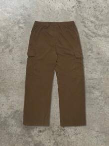 Yemwry Pantalones informales de unicolor con bolsillo y cremallera para hombres. Pantalones de pana marrón clásicos con una textura fina. El detalle de la cremallera agrega personalidad, el ajuste relajado es cómodo y versátil, adecuado para varios estilos, mostrando un gusto único.