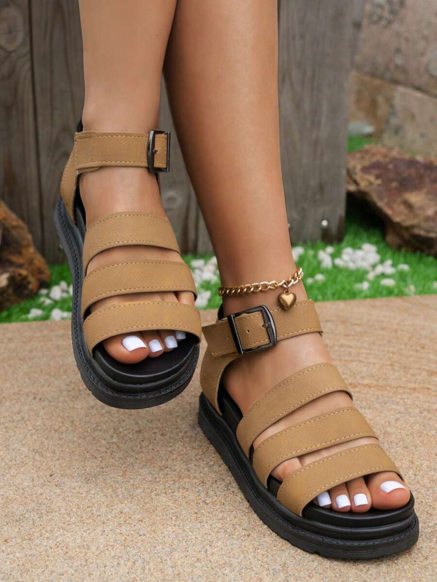 Sandales plateforme femme au style moto, avec une semelle épaisse augmentant la hauteur, bout rond, confortable, design large avec bride et tige ajourée. Style simple, mode, polyvalent, idéal pour le port quotidien, le travail, le campus, les festivals de musique, les fêtes de plage, les sorties, les vacances.