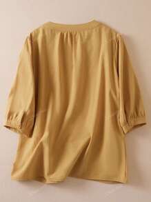 Blusa de verano casual de mujer con cuello en V, mangas abultadas y bordado de unicolor
