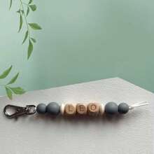 1 pieza Llavero personalizado de bola de silicona redonda, letras inglesas personalizadas, llavero con nombre, accesorios para bolsos, regalos para familiares y amigos, accesorios de vestir, elegante otoño, novio, novia, familia, amigos, baratijas - llavero de cuentas de madera - Ver 30