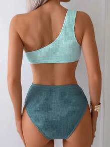 Nowy europejski i amerykański damski, elegancki, jednoczęściowy kostium kąpielowy z dzianiny na jedno ramię, wykonany z włókna poliestrowego i włókna elastycznego, o wysokiej elastyczności, w jednolitym kolorze, seksowny, jednoczęściowy kostium kąpielowy z wydrążonymi detalami.