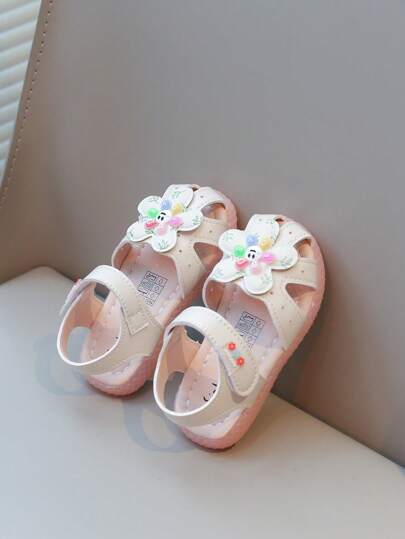 Nuevos Sandalias para niñas pequeñas, diseño floral con cara sonriente adorable de punta cerrada, suela blanda antideslizante, livianas y cómodas, adecuadas para el verano