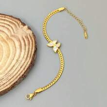 1 pièce Bracelet minimaliste en acier inoxydable avec chaîne coup de fouet et papillon coquille blanche, convient pour la tenue de tous les jours ou de travail des femmes