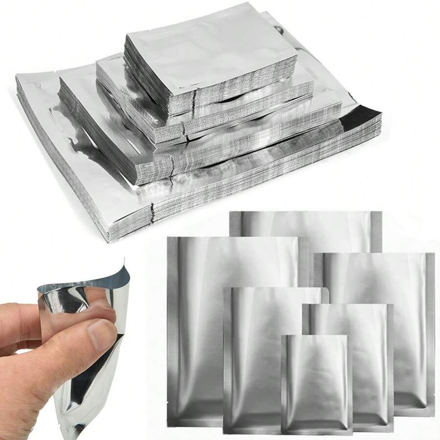 50 piezas de bolsas de embalaje de alimentos de aluminio, sellables al calor, adecuadas para almacenar alimentos, granos de café, hojas de té, granos y talla grande - Plateado - Ver 1