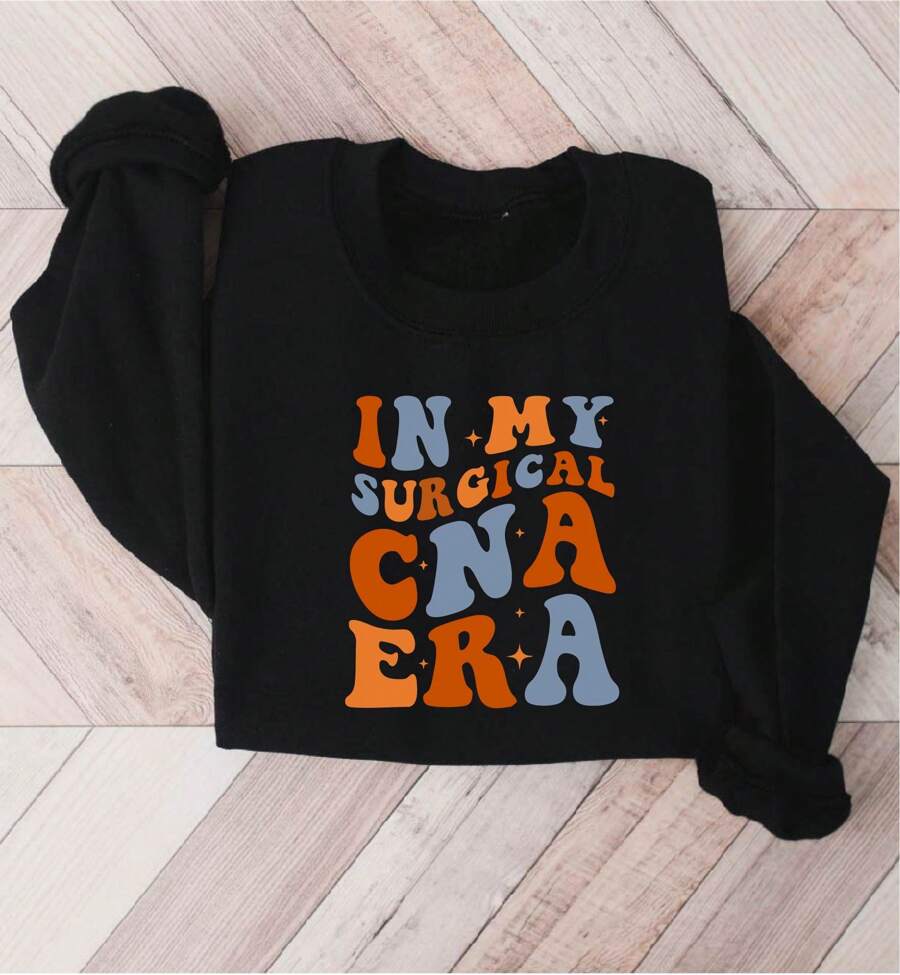 In My CNA Era Sweatshirt, In My Surgical CNA Sweater, CNA Sweatshirts, Gift For CNA, Nurse Life Sweaters, CNA Life Sweatshirt, Compassionate Nurse Sweater, Nursing School. SD-3272 - Black - View 1