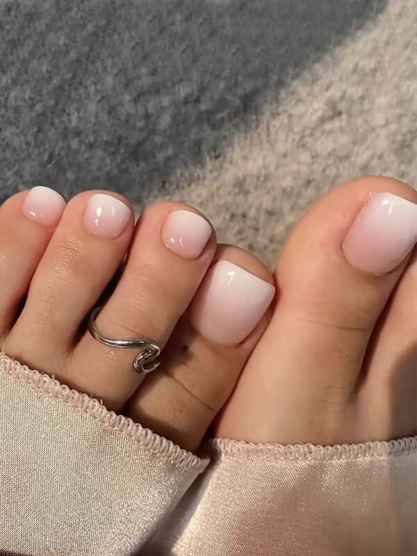 Elegant Pink Nude Toe Nail Extensions With Gradient Design And Shiny Finish Toe Nails