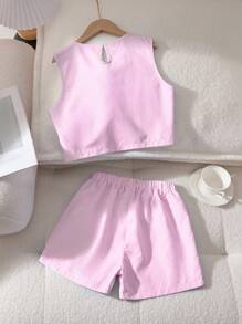 两件套优雅休闲女童上衣套装，时尚水滴形纽扣无袖上衣+运动短裤，面料柔软舒适，适合春、夏、秋、冬四季及各种节日穿着，是送给女儿的户外礼物。 - 粉色 - 查看 3