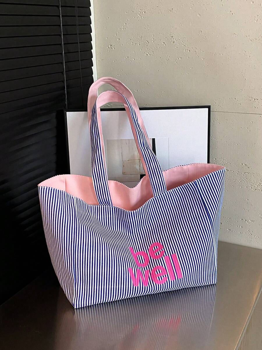 Esta bolsa de lona a rayas de doble cara es una bolsa de compras ligera, casual y minimalista, adecuada para mujeres jóvenes, principiantes y trabajadores de oficina. Es perfecta para la universidad, es una opción ideal para el regreso a clases, el primer día de clases, la playa, las vacaciones, la bolsa escolar y un artículo imprescindible para la universidad. Bolsa de lona, atuendos de verano - Azul - Ver 1