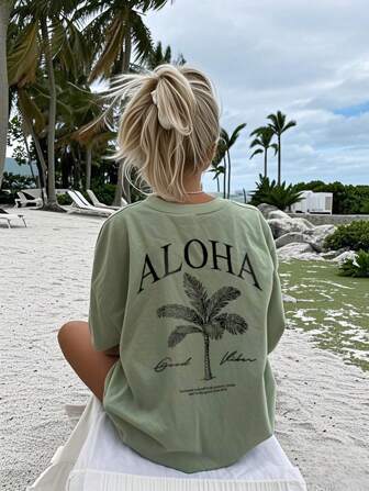 Damen Frühling und Sommer neue Palme Schriftzug Muster Alltag Lässig Rundhals Kurzarm T-Shirt, modischer Urlaubsstil, Ihr tägliches Essential. Grafik T-Shirts Frauen Weißes Top Schwarzes Top Rosa Top Urlaubsoutfits Frauen