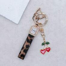 TTOBS 1pc Exquisitely Crafted Leopard Print Leather Car Key Chain With Adorable Cherry Pendant - , Fashionable And Multi-Functional Backpack Keychain - The Perfect Accessory For Backpacks. The Perfect Valentine's Day Gift, Also An Ideal Gift For Your Beloved Girlfriend.