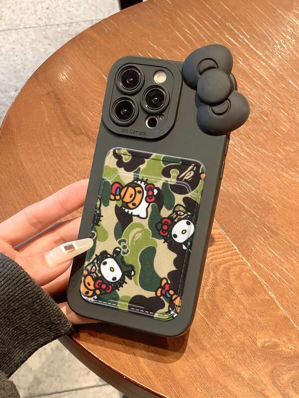 Sanrio Camouflage Hello Kitty Eye Design Black Card Holder & Phone Protective Case Fits Apple 16ProMax/11/12/13/14Plus/15Pro/XR/XS