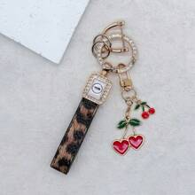 TTOBS 1pc Exquisitely Crafted Leopard Print Leather Car Key Chain With Adorable Cherry Pendant - , Fashionable And Multi-Functional Backpack Keychain - The Perfect Accessory For Backpacks. The Perfect Valentine's Day Gift, Also An Ideal Gift For Your Beloved Girlfriend.