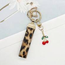 TTOBS 1pc Exquisitely Crafted Leopard Print Leather Car Key Chain With Adorable Cherry Pendant - , Fashionable And Multi-Functional Backpack Keychain - The Perfect Accessory For Backpacks. The Perfect Valentine's Day Gift, Also An Ideal Gift For Your Beloved Girlfriend.