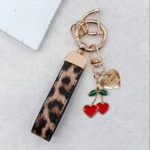 TTOBS 1pc Exquisitely Crafted Leopard Print Leather Car Key Chain With Adorable Cherry Pendant - , Fashionable And Multi-Functional Backpack Keychain - The Perfect Accessory For Backpacks. The Perfect Valentine's Day Gift, Also An Ideal Gift For Your Beloved Girlfriend.