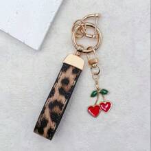 TTOBS 1pc Exquisitely Crafted Leopard Print Leather Car Key Chain With Adorable Cherry Pendant - , Fashionable And Multi-Functional Backpack Keychain - The Perfect Accessory For Backpacks. The Perfect Valentine's Day Gift, Also An Ideal Gift For Your Beloved Girlfriend.