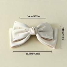 1个优雅蝴蝶结发夹，高品质时尚春季发夹，简约时尚设计，适合日常佩戴、派对、通勤、度假等场合。是打造各种发型、扎马尾辫、洗脸或化妆的绝佳配饰。情人节礼物佳选，也可作为发带、头巾、发箍、吸汗带、发箍、秋冬发饰、女士优雅围巾、女士头巾、柔软头巾等使用。