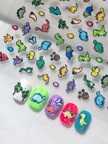 Pegatinas populares y lindas de dinosaurios de diferentes colores y variedades de dinosaurios de dibujos animados para decorar las uñas en el salón de belleza