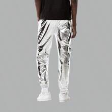 Pantaloni sportivi metallizzati e luccicanti, pantaloni lunghi elasticizzati per uomo adatti per feste