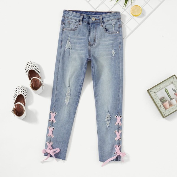 

Girls Grommet Lace Up Ripped Jeans