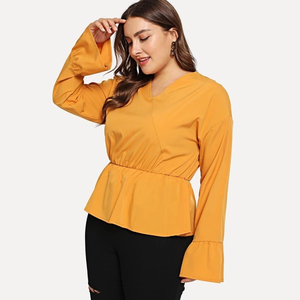 

Plus V Neck Ruffle Top