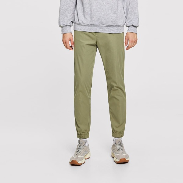 

Men Drawstring Waist Elastic Hem Solid Pants, Green