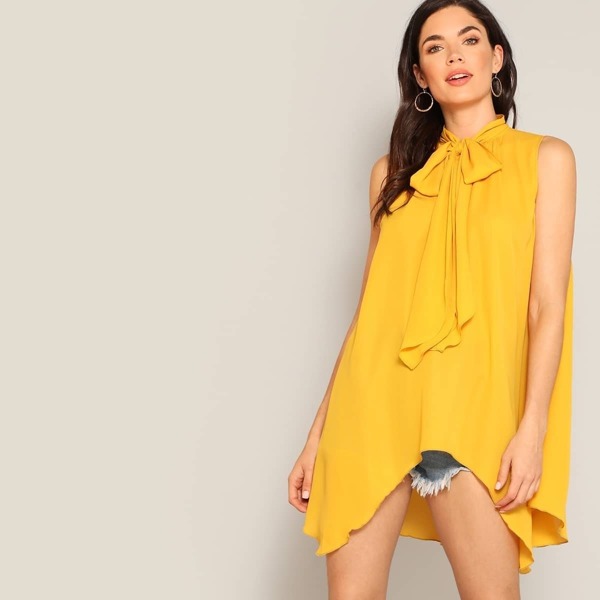 

Tie Neck Asymmetrical Swing Top