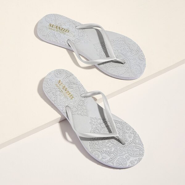 

Textured Embossed Sole Flip Flops
