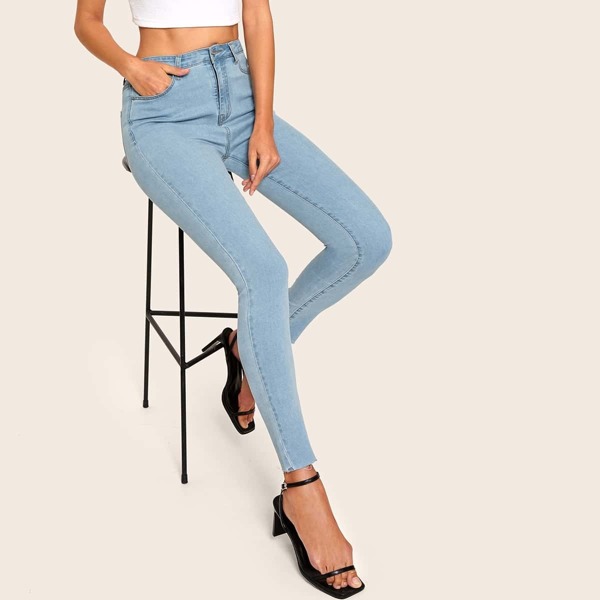 

Light Wash Raw Hem Skinny Jeans