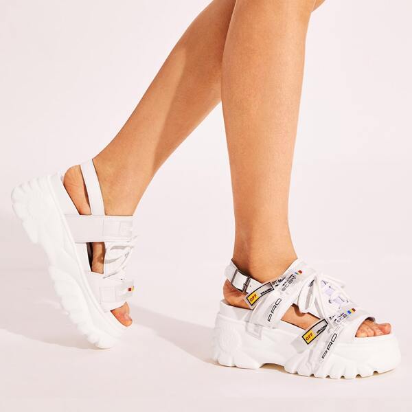 

Lace-up Front Slingback Cut Out Sandals