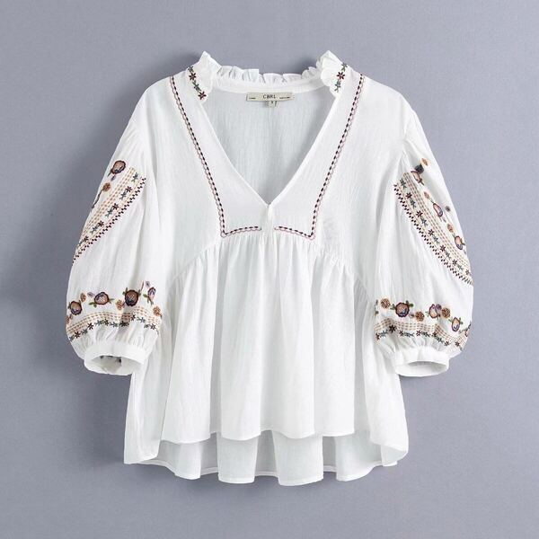 

Floral Embroidery Peplum Blouse
