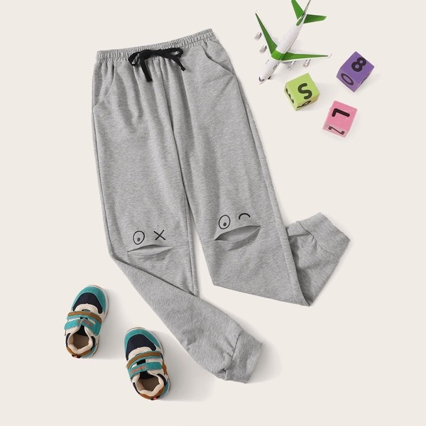 

Boys Slant Pocket Cartoon Print Peekaboo Sweatpants